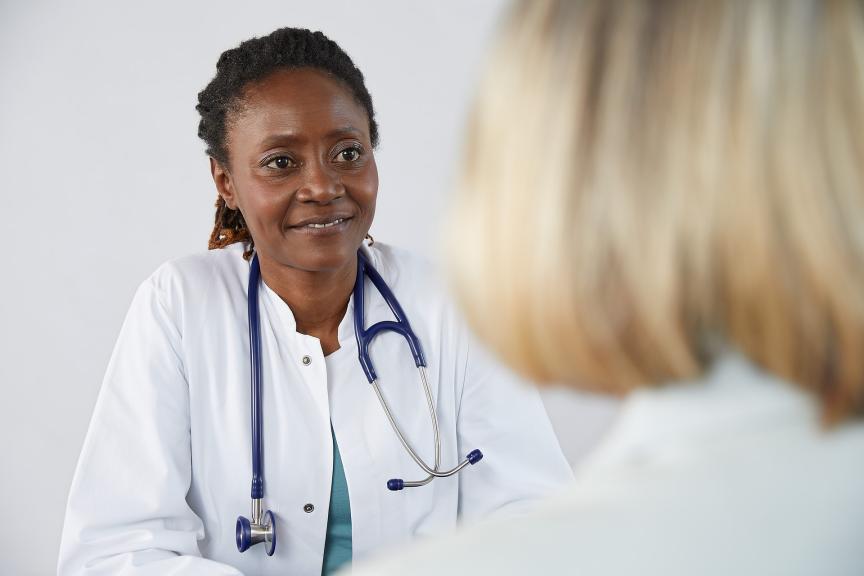 Female doctor talking to a patient