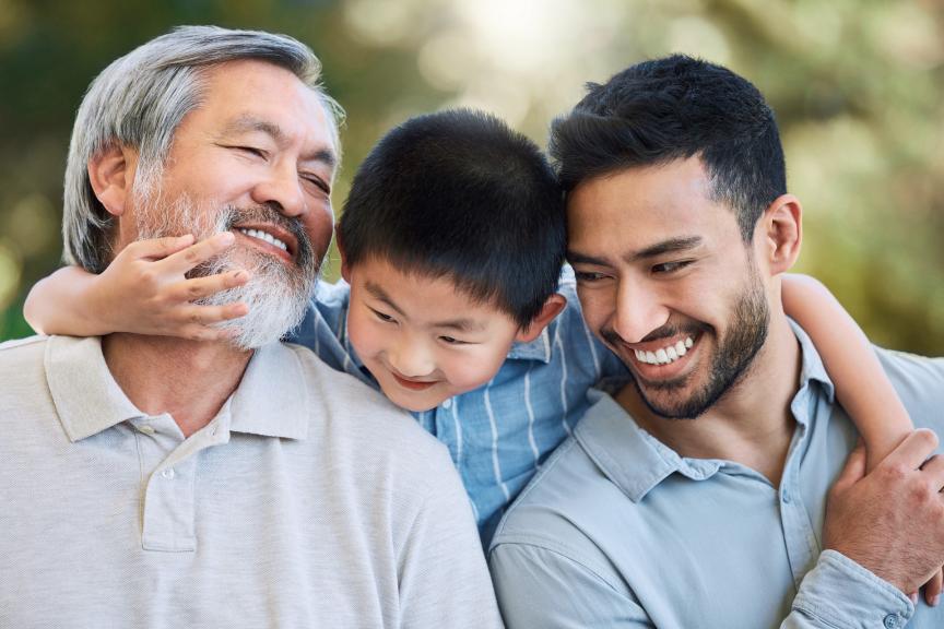 East Asian male family members laughing together