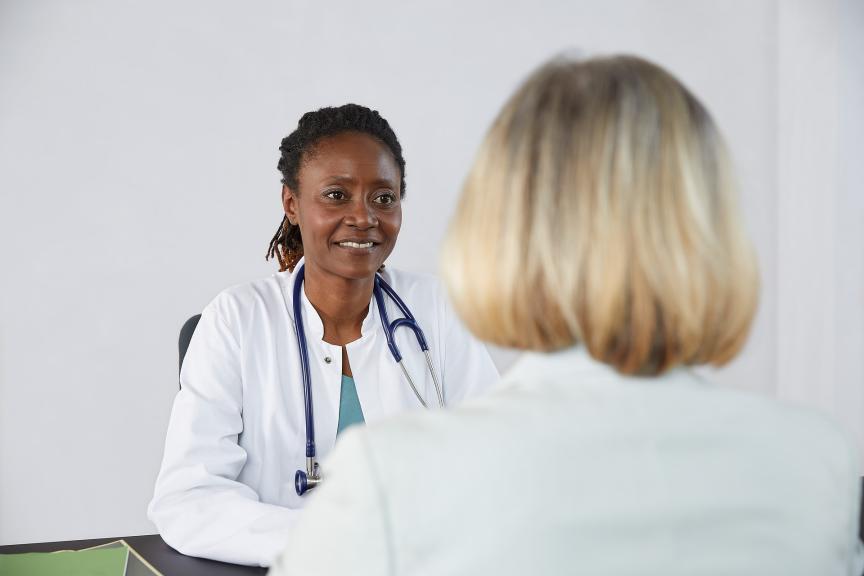 Physician talking to a patient