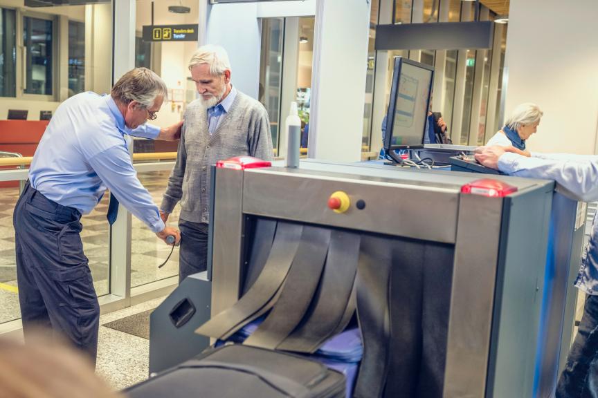 Man at the security check at the airport