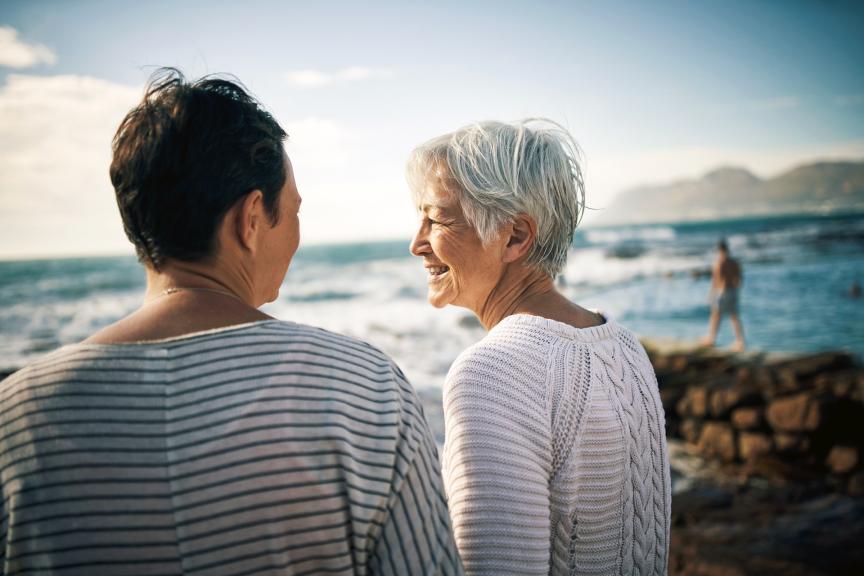 Two people looking at the sea