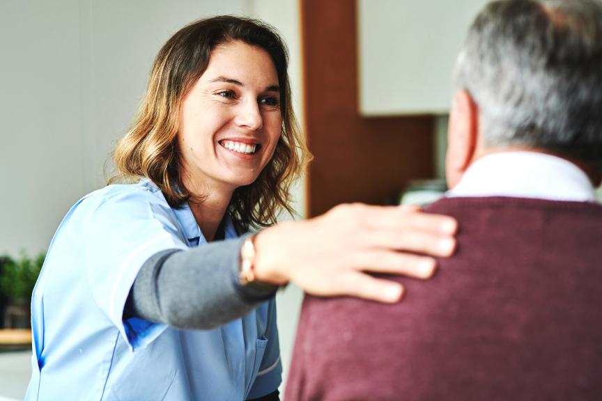 Health care professional with a patient