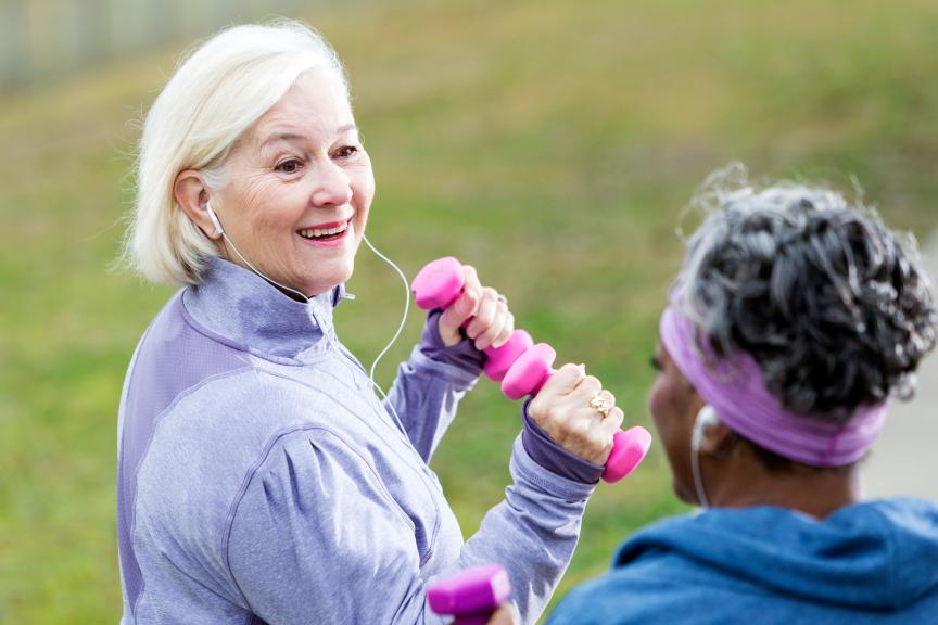 Older woman excercising in a park