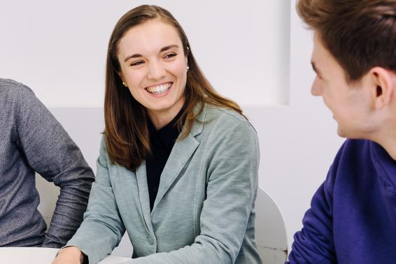 Young employees talk to each other